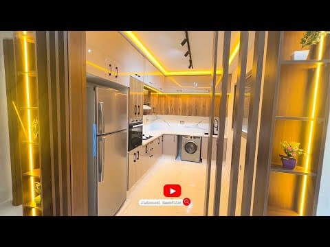 Appartement de 97 m² avec balcon, cuisine moderne, trois chambres, salon et deux salles de bains
